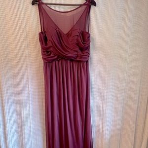 Only worn once. A few small stains on the skirt but could be removed easily.